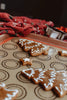 silicone baking mat with Christmas cookies