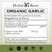 Herbal Roots Organic Garlic supplement facts label with serving size as 2 vegan capsules, 30 servings per container. Amount per 2 capsules is 600 mg of organic garlic. Other ingredients: Organic capsules (vegan) and nothing else! There are a USDA Organic, GMP certified, family owned business, vegan and tree free paper badges.